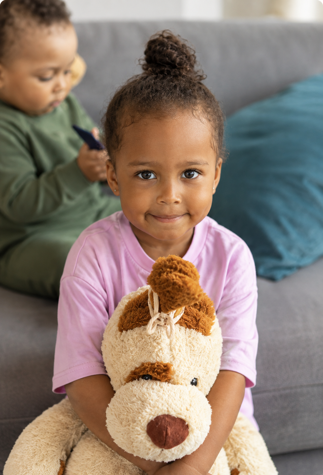 Child playing with a curated Whirl toy kit