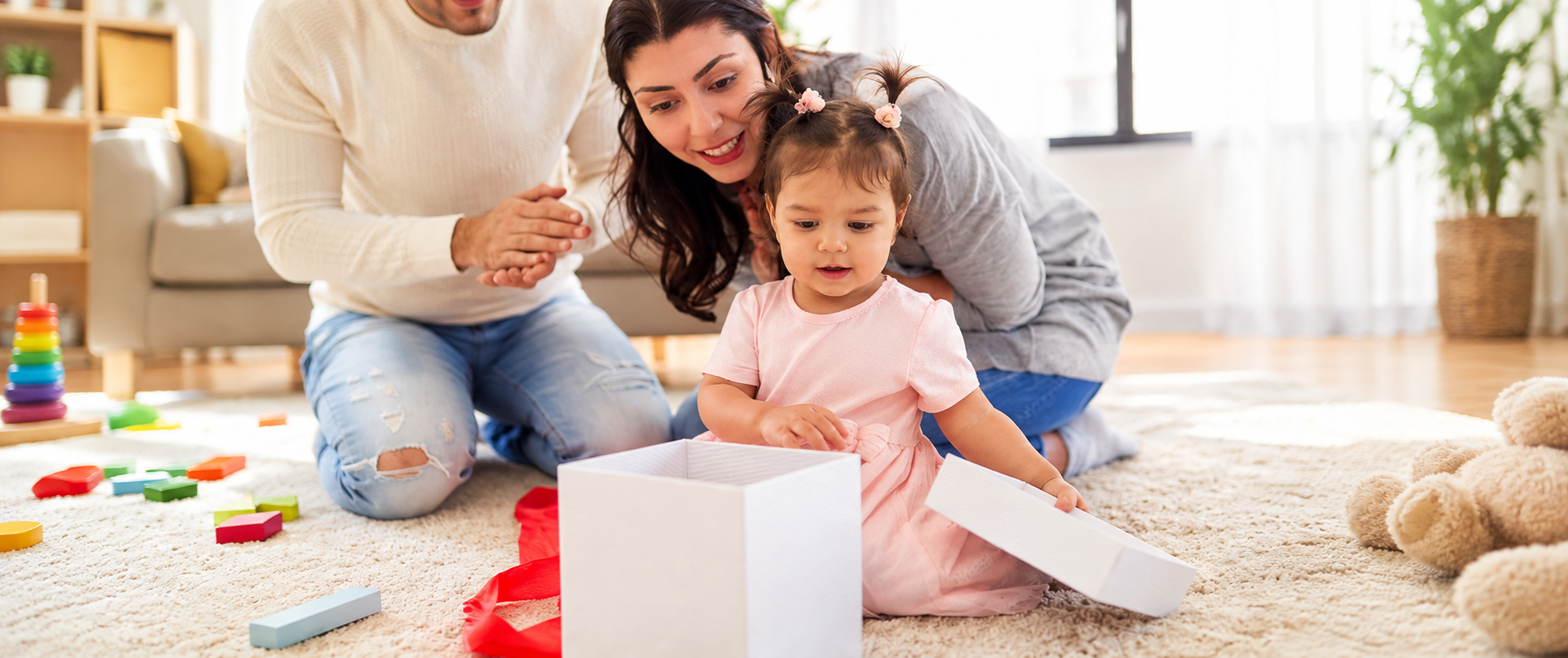 Parent and child unpacking a Whirl activity kit together