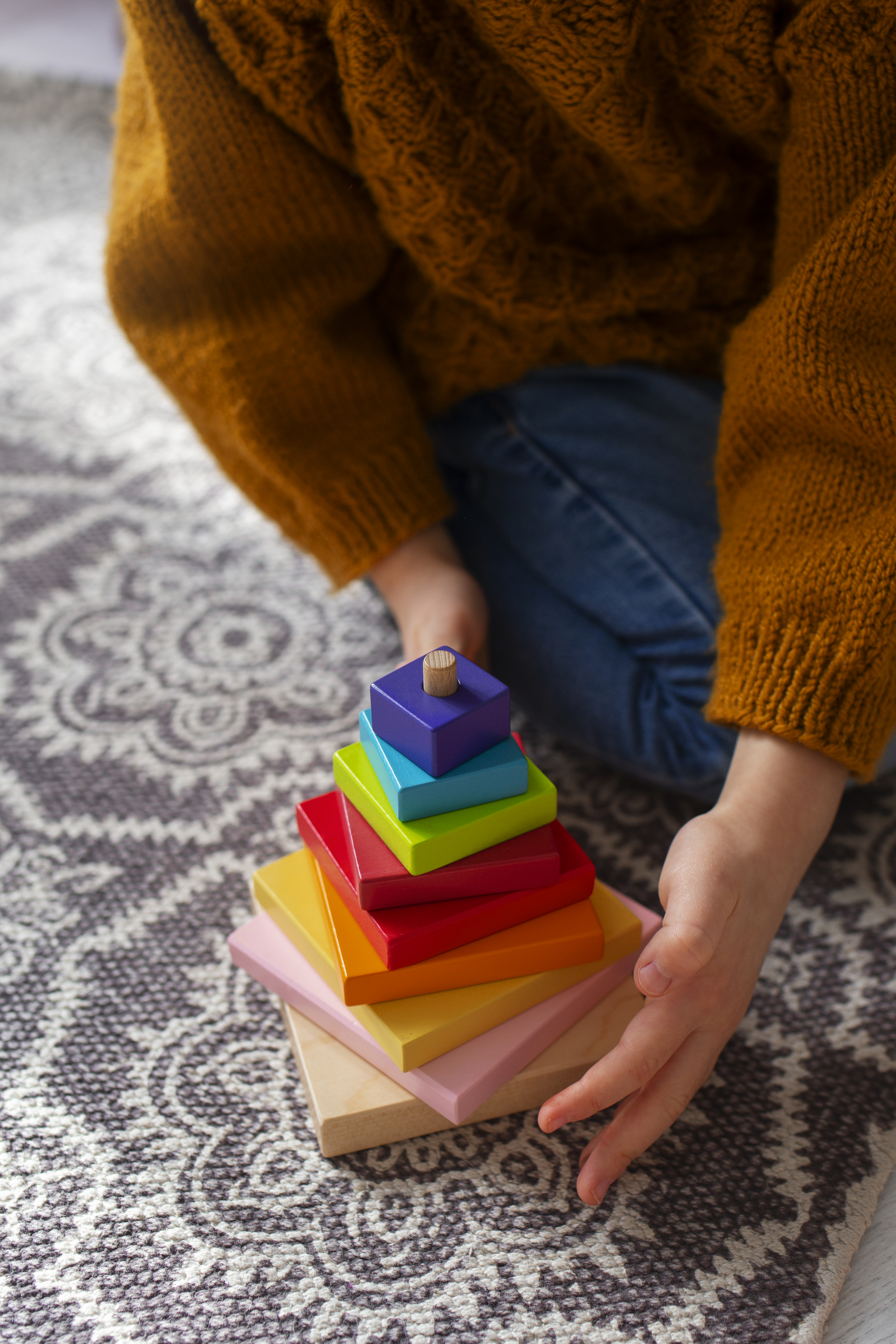 Wooden stacking rainbow toy